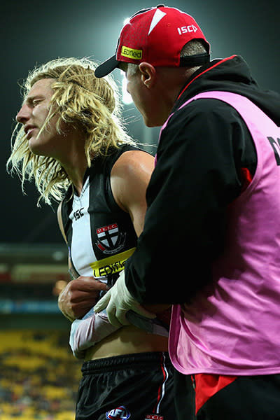 St Kilda's Eli Templeton faces a lengthy stint on the sidelines after breaking his arm against Brisbane