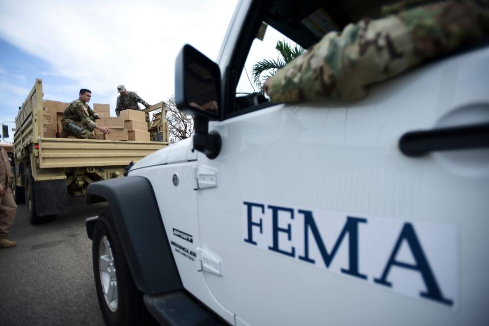 A FEMA truck is shown as Department of Homeland Security personnel deliver supplies to Santa Ana community residents in the aftermath of Hurricane Maria in Guayama, Puerto Rico.