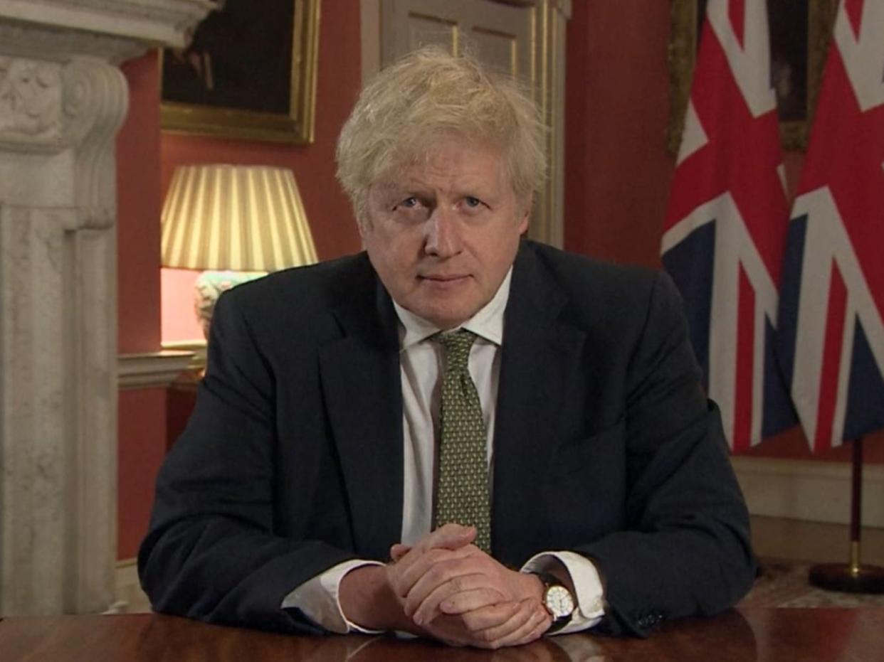 Boris Johnson making a televised address to the nation from 10 Downing Street setting out the terms of the latest coronavirus lockdown (PA)