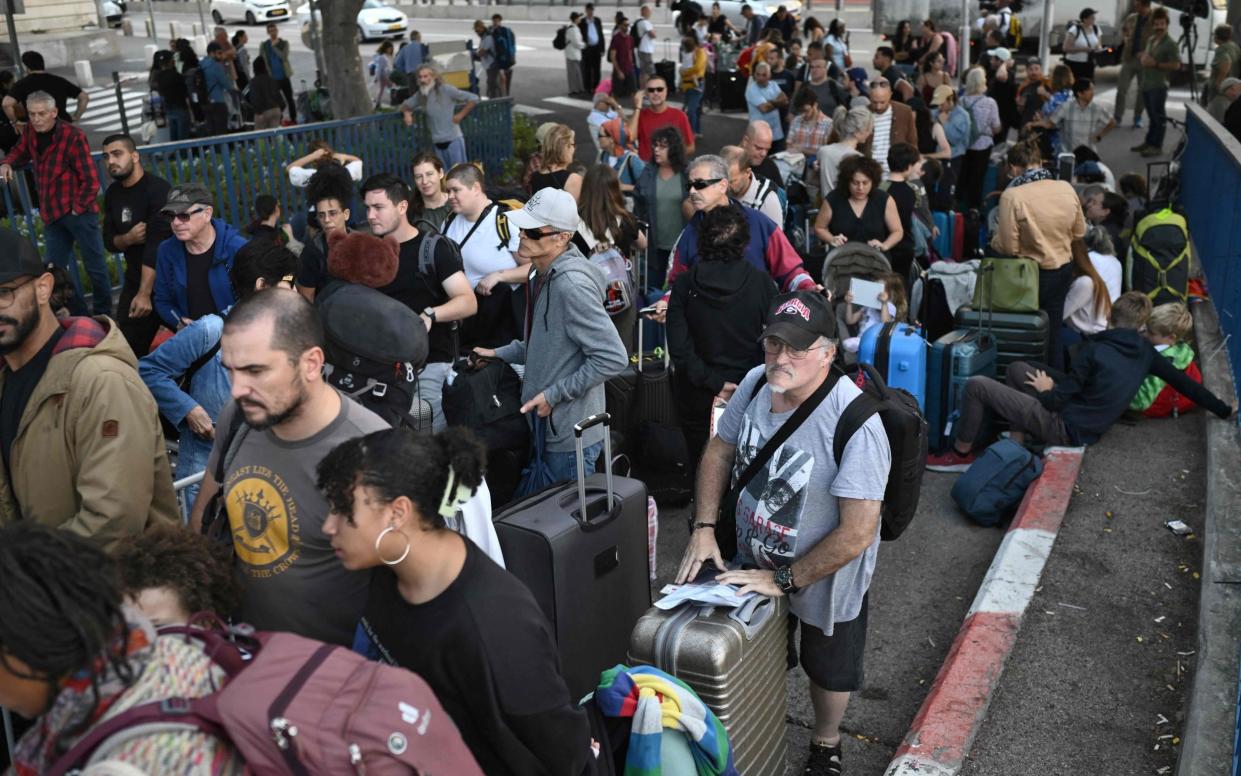 US citizents wait to be evacuated from the port of Haifa to Cyprus, on October 16, 2023