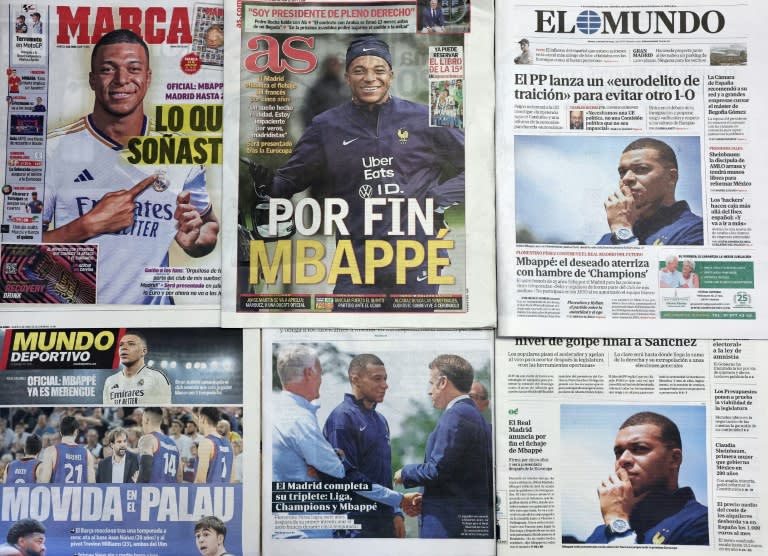 This picture taken on June 4, 2024 shows several Spanish newspapers' front pages a day after French forward <a class="link " href="https://sports.yahoo.com/soccer/players/3893765/" data-i13n="sec:content-canvas;subsec:anchor_text;elm:context_link" data-ylk="slk:Kylian Mbappe;sec:content-canvas;subsec:anchor_text;elm:context_link;itc:0">Kylian Mbappe</a> signed for <a class="link " href="https://sports.yahoo.com/soccer/teams/real-madrid/" data-i13n="sec:content-canvas;subsec:anchor_text;elm:context_link" data-ylk="slk:Real Madrid;sec:content-canvas;subsec:anchor_text;elm:context_link;itc:0">Real Madrid</a> (Thomas COEX)