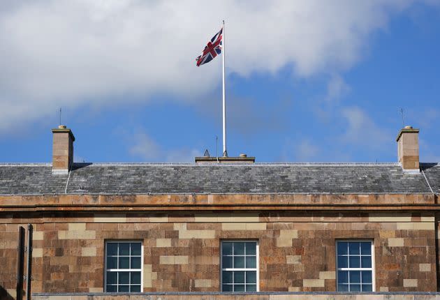 The Union Jack flies at full mast at Hillsborough Castle, Belfast, after the Proclamation of Accession of King Charles III. (Photo: Brian Lawless - PA Images via Getty Images)