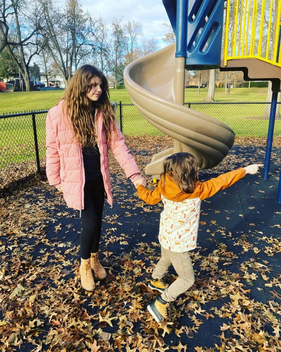 Aiden Moore-Van De Rostyne, 16, of Walla Walla, plays with her 6-year-old brother, Benson Moore. Experimental gene therapy has improved Aiden’s sight.