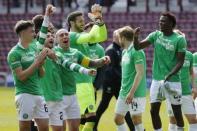 Britain Football Soccer - Heart of Midlothian v Celtic - Scottish Premiership - Tynecastle - 2/4/17 Celtic's Scott Brown and teammates celebrate winning the Scottish Premiership Reuters / Russell Cheyne Livepic