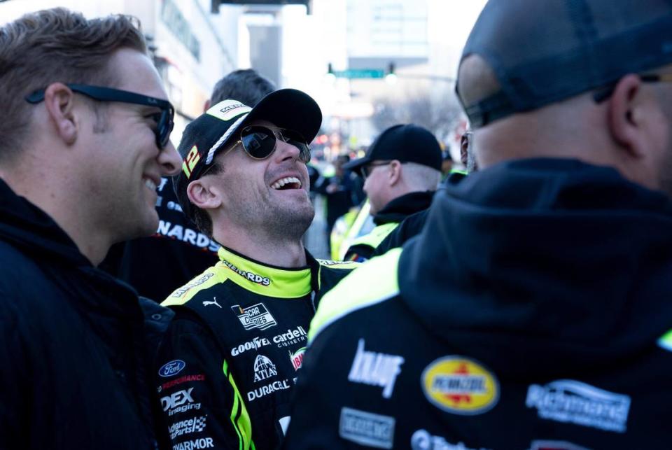 2023 NASCAR Points Champion Ryan Blaney (12) signs autographs during the NASCAR Champions Car Parade in Nashville, Tenn., Wednesday, Nov. 29, 2023.