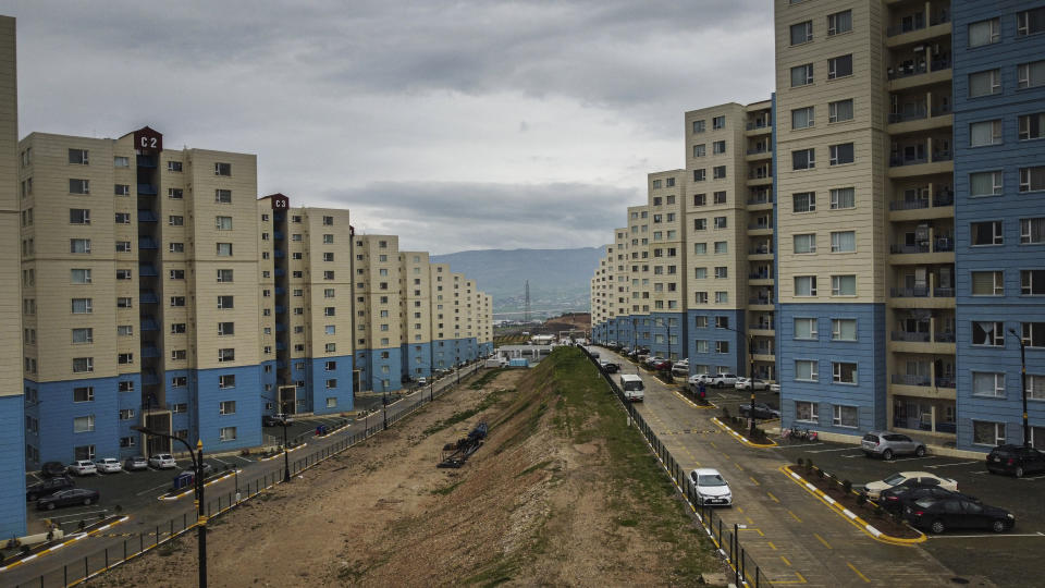 New housing development is seen in the town of Sulaimaniyah, Iraq, Tuesday, March 21, 2023. The Kurdish in Iraq region won de facto self-rule in 1991 when the United States imposed a no-fly zone over it in response to Saddam's brutal repression of Kurdish uprisings. With American invasion 20 years ago much of Iraq fell into chaos, as occupying American forces fought an insurgency and as multiple political and sectarian communities vied to fill the power vacuum left in Baghdad. But the Kurds, seen as staunch allies of the Americans, strengthened their political position and courted foreign investments. (AP Photo/Hawre Khalid, Metrography)