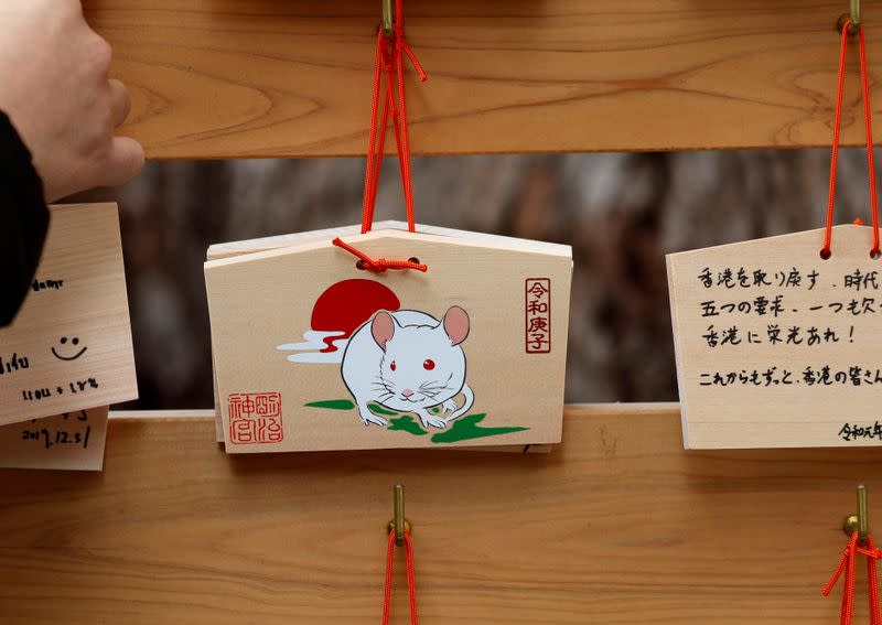 A message on an 'Ema', or a wooden prayer tablet, reading support messages of pro-democracy movements in Hong Kong, is seen on the first day of the new year at the Meiji Shrine in Tokyo