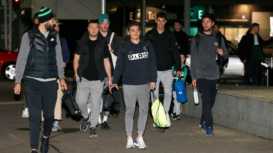 A-League players are seen here ready to fly out of Melbourne.