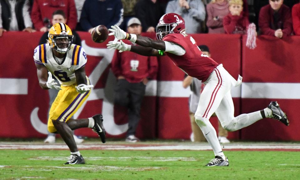 Alabama Crimson Tide defensive back Terrion Arnold (3) breaks up a pass intended for LSU Tigers wide receiver Malik Nabers (8) at Bryant-Denny Stadium in Tuscaloosa, Ala., on Nov. 4, 2023.