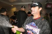 WASHINGTON - SEPTEMBER 27: Jamie Moyer of the Philadelphia Phillies celebrates clinching the National League EasT title after a baseball game against the Washington Nationals on September 27, 2010 at Nationals Park in Washington, D.C. The Phillies won 8-0. (Photo by Mitchell Layton/Getty Images)