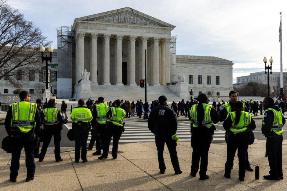 Police officers stand outside the Supreme Court on Feb. 8, 2024, in Washington, D.C. / Credit: JULIA NIKHINSON / Getty Images