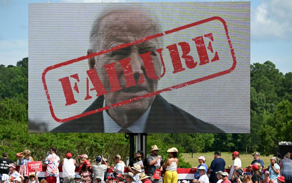 A poster mocking Joe Biden greeted Trump supporters who came to a campaign rally in Chesapeake, Virginia, after the debate