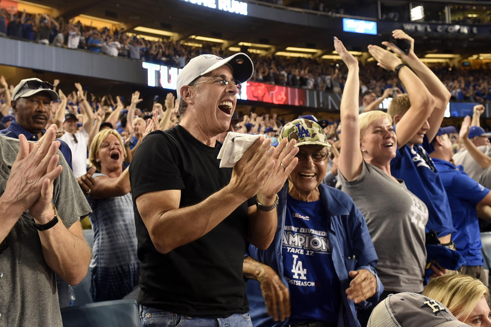 <p>Forget the sarcasm. Comedian and New York Mets fan Jerry Seinfeld was unabashedly thrilled to see the Dodgers win — and the Houston Astros lose — during the first game of the series. (Photo: LG Patterson/MLB Photos via Getty Images) </p>