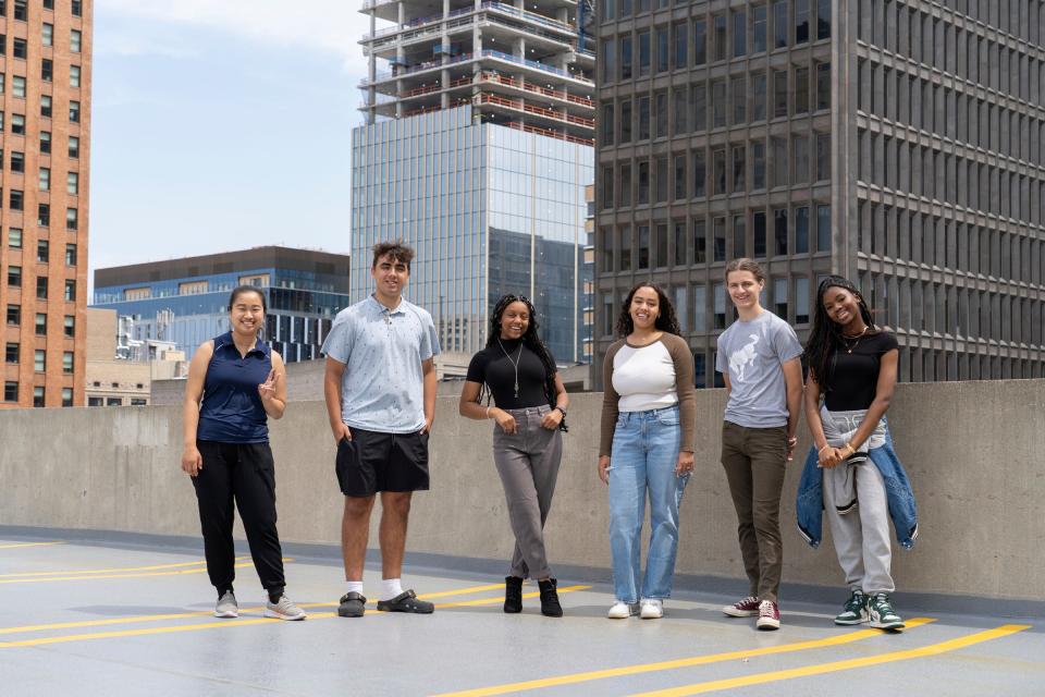 Detroit Free Press high school apprentices Sandra Fu, left, Anthony Schulte, Alauna Marable, Caya Craig, Jack Williams and Maria Witcher pose for a photo in downtown Detroit on July 11, 2023.