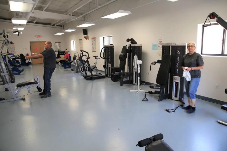 Members of the fitness center at the Bonnie Dallas Senior Center in Farmington work out on Aug, 21, 2019.