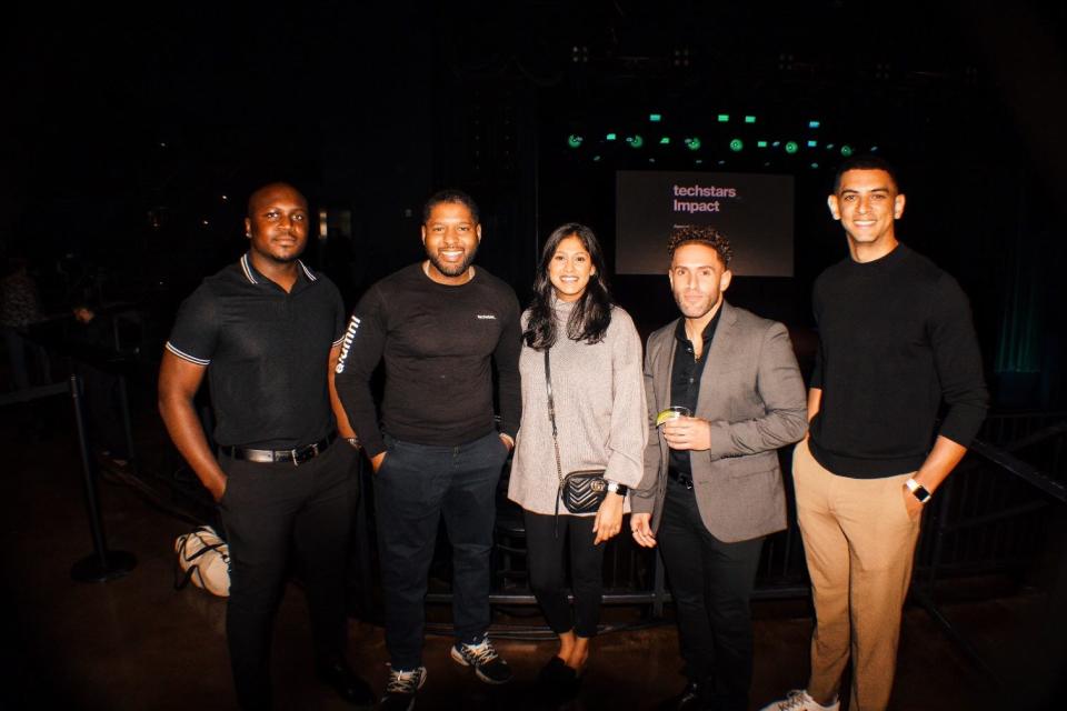 Andre Peart, CEO of Untapped Solutions, with members from TechStars, a tech company that invested in Peart's website.