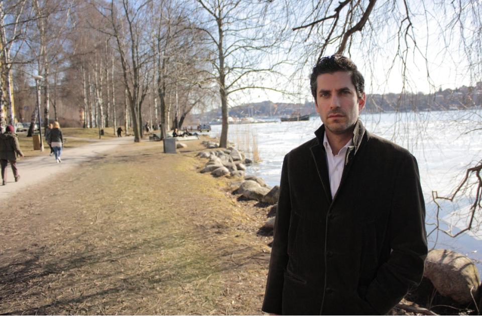 Swedish author Jens Lapidus whose book “Easy Money” was released in the U.K. last month and will go on sale in the U.S. on April 3, poses for a photo in Stockholm, Sweden Thursday March 15 2012. The 37-year-old criminal lawyer has set a different tone from his compatriot authors Henning Mankell and Steig Larsson, producing a realistic, fast-paced novel about Stockholm's organized crime, seen through the eyes of the bad guys. (AP Photo/ Malin Rising)