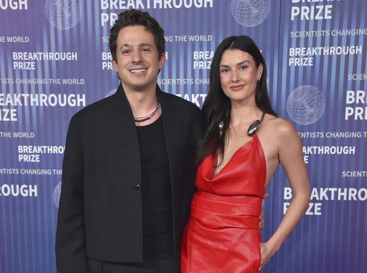 Charlie Puth, left, and Brooke Sansone arrive at the 10th Breakthrough Prize Ceremony on Saturday, April 13, 2024, at the Academy Museum of Motion Pictures in Los Angeles. (Photo by Jordan Strauss/Invision/AP)