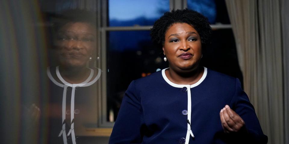 Georgia gubernatorial Democratic candidate Stacey Abrams speaks during an interview with The Associated Press on Thursday, Dec. 16, 2021, in Decatur, Ga