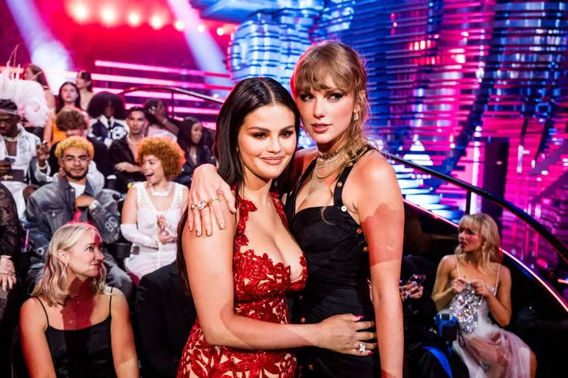 Selena Gomez and Taylor Swift standing together