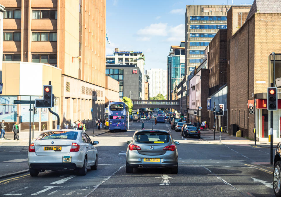 Glasgow, Scotland - Rear view of cars waiting at traffic lights in central Glasgow.