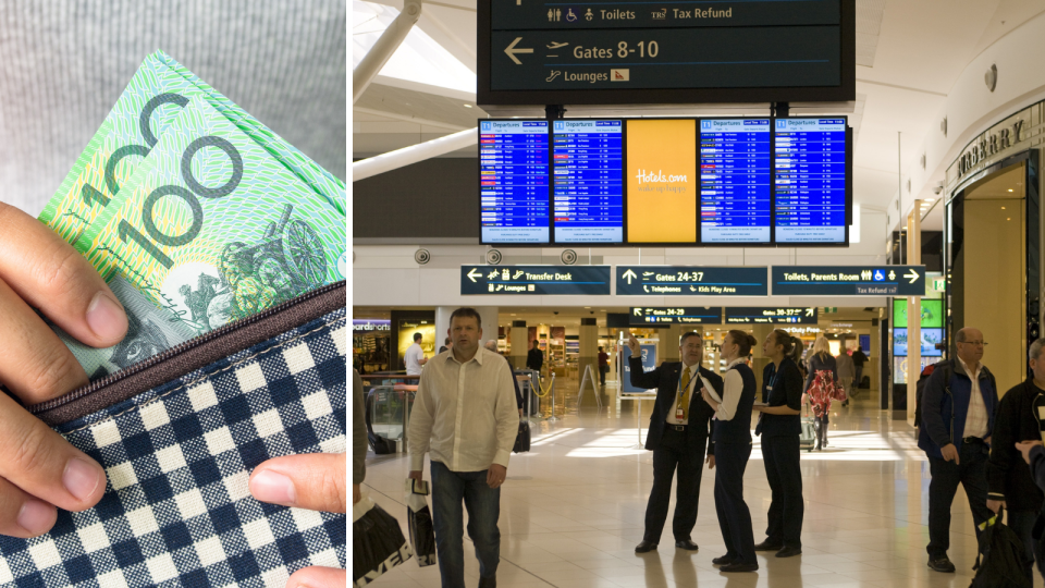 A person removing money from a wallet and travellers inside an airport international terminal.