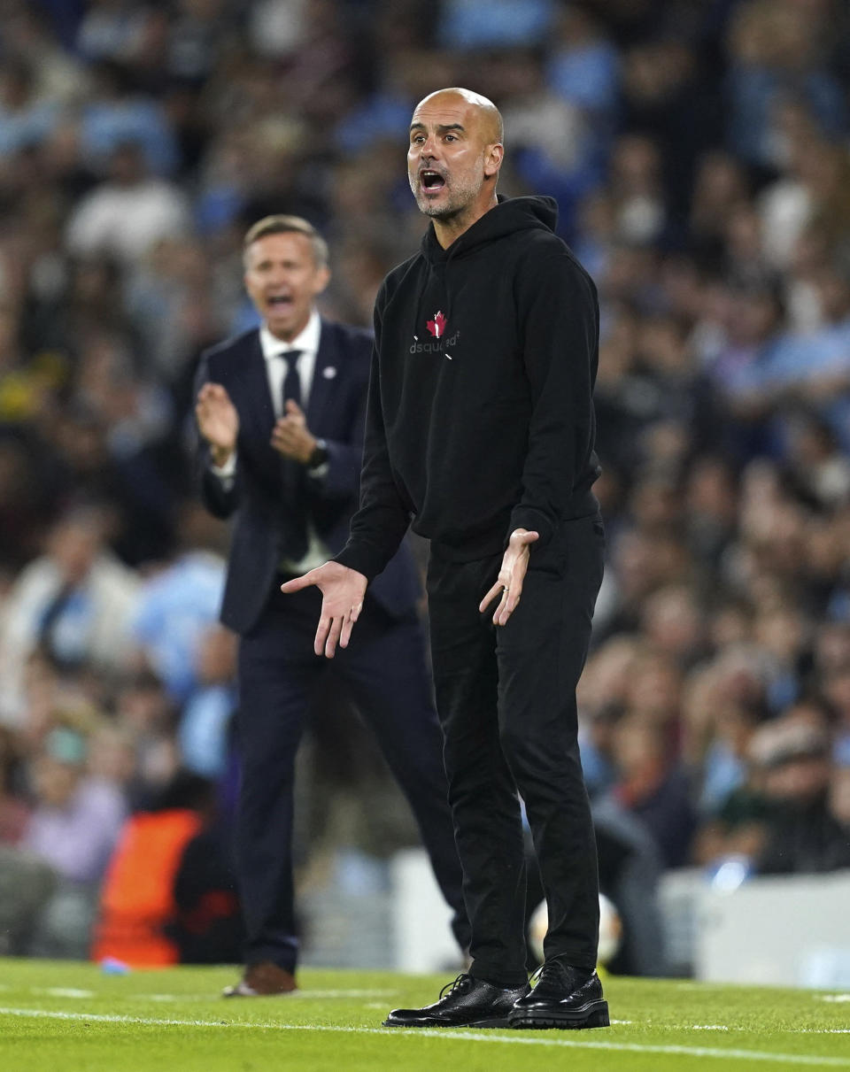 Manchester City manager Pep Guardiola on the touchline during the Champions League Group A soccer match between Manchester City and RB Leipzig at the Etihad Stadium, Manchester, England, Wednesday Sept. 15, 2021. (Martin Rickett/PA via AP)