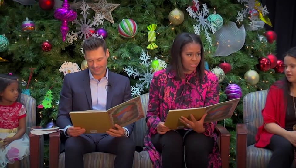 Ryan Seacrest and Michelle Obama read Christmas stories to children at the hospital, and it’s making our hearts swell