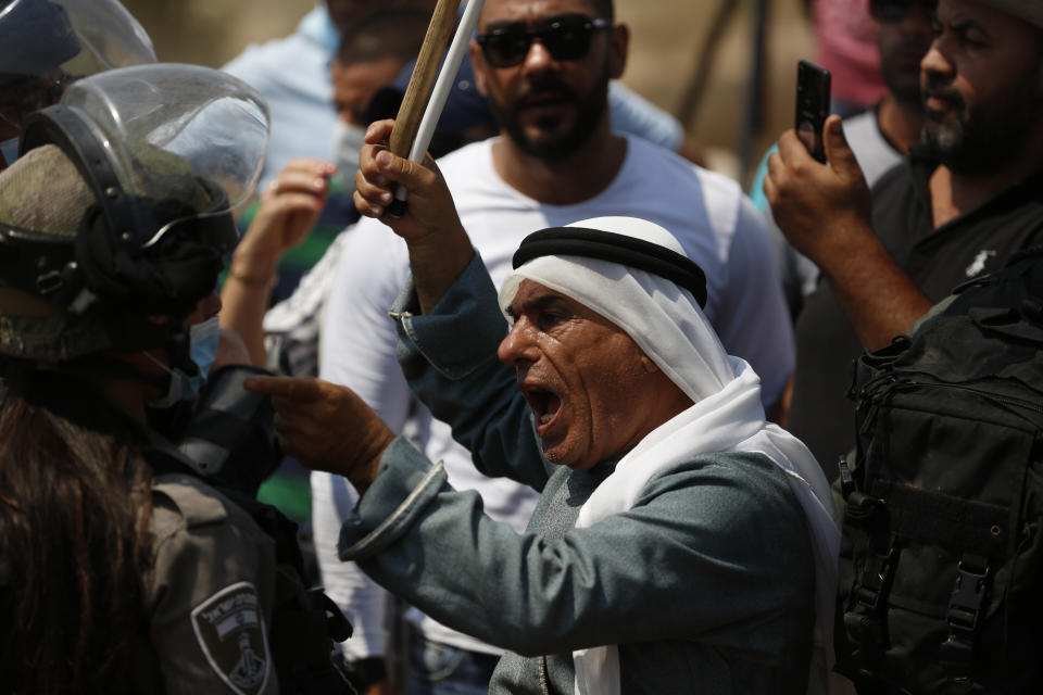 Palestinians protest against expansion of Israeli settlements in the village of Shufa in the West Bank, Tuesday, Sep. 1, 2020.(AP Photo/Majdi Mohammed)