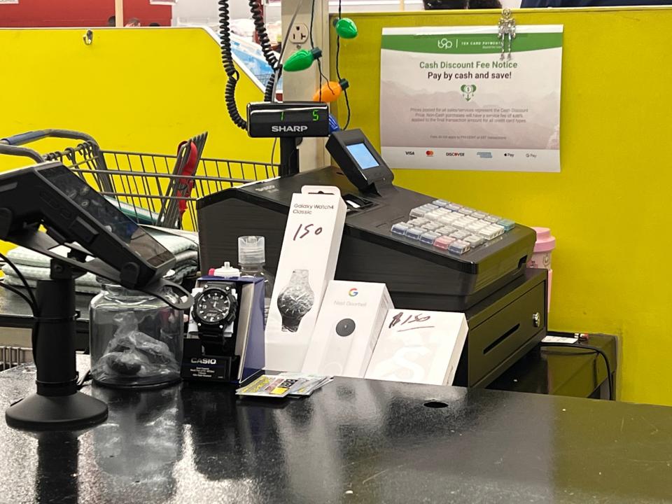 expensive electronics near cashier at crazy hot deals