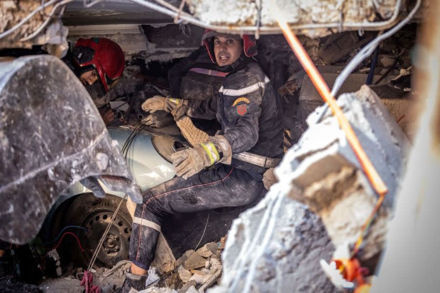 Rescue workers search for survivors in a collapsed house in Moulay Brahim, Al Haouz province, on September 9, 2023, after an earthquake in Morocco. (Fadel Senna/AFP via Getty Images)