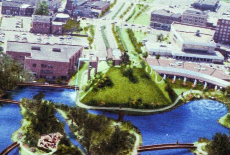 A main feature for downtown Fayetteville proposed in the 1996 Marvin Plan was The Mound. This 60-foot-tall earthen structure would have had walking paths, an elevator, a conservatory, a 40-foot waterfall, and a restaurant at the top. It would have been across Ray Avenue from the Cumberland County Headquarters Library, where the Festival Park Plaza building is now.