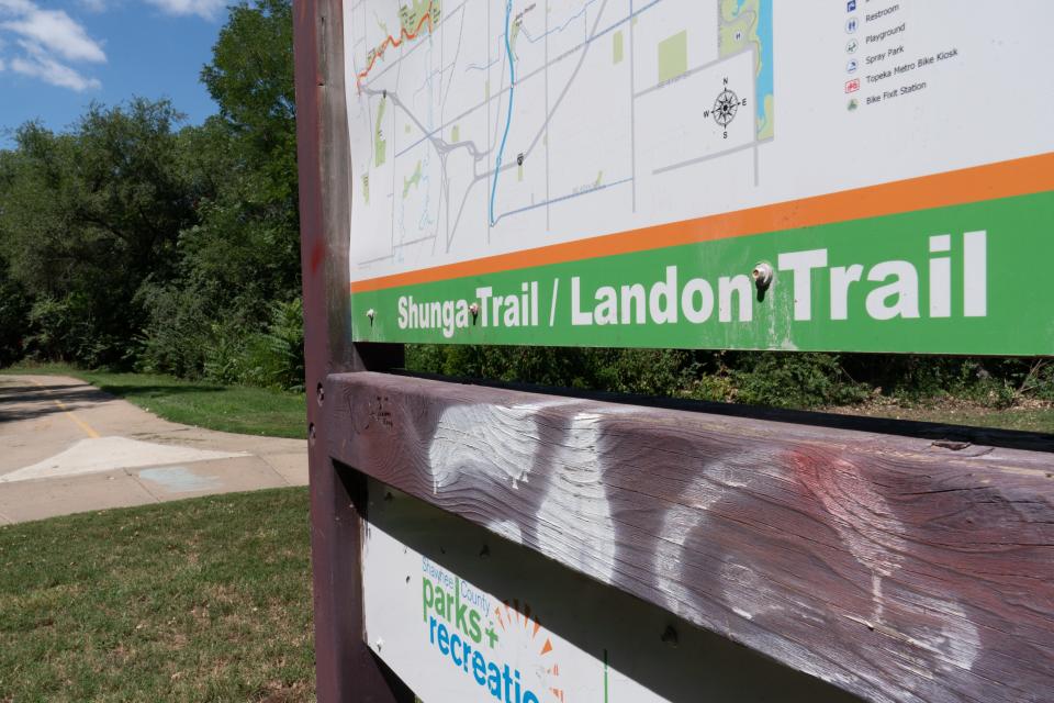 Shawnee County commissioners moved Thursday toward potentially banning unauthorized camping on county property and requiring leashes for dogs in the county's parks and on its trails.