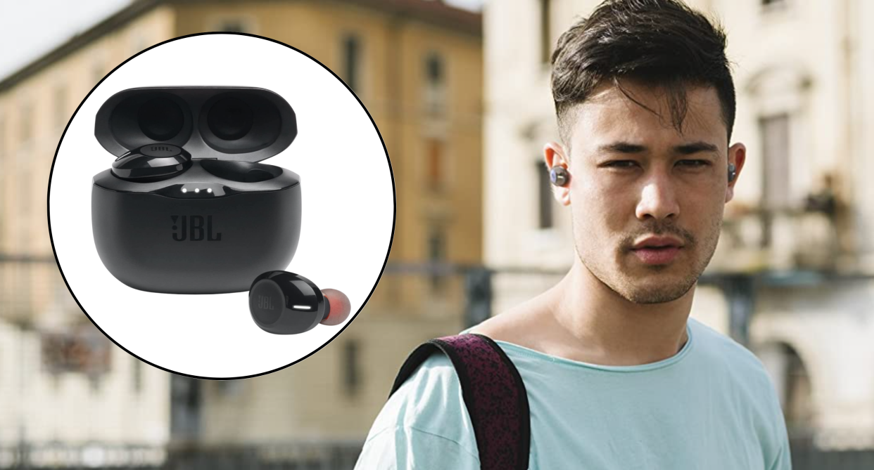 young man wearing t-shirt and backpack wearing jbl audio wireless earbuds, JBL wireless earbuds