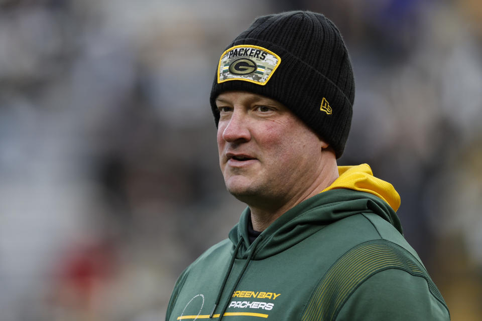 FILE - Green Bay Packers offensive coordinator Nathaniel Hackett looks on during pre-game warm-ups before an NFL football game against the Cleveland Browns Saturday, Dec. 25, 2021, in Green Bay, Wis. A person with knowledge of the negotiations told The Associated Press early Thursday morning, Jan. 27, 2022, that the Denver Broncos are finalizing a deal to hire Packers offensive coordinator as their new head coach. The person spoke on condition of anonymity because the deal was still in the works and the team hadn't announced the hiring. (AP Photo/Jeffrey Phelps, File)