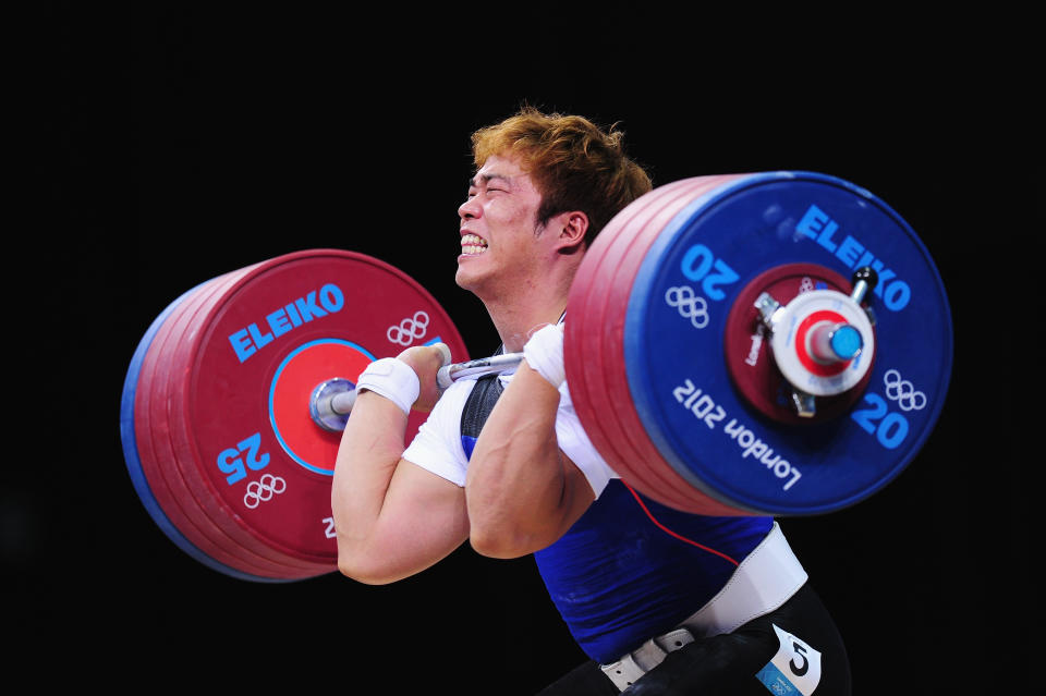 LONDON, ENGLAND - AUGUST 04: competes in the Men's 94kg Weightlifting final on Day 8 of the London 2012 Olympic Games at ExCeL on August 4, 2012 in London, England. (Photo by Mike Hewitt/Getty Images)