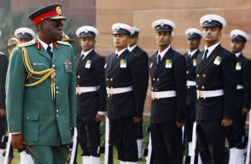 Nigeria's former national security adviser, Owoye Azazi (left) shown in India in 2008. A blast went off outside a nightclub in the Nigerian capital Abuja late Friday, hours after Azazi and defence minister were sacked amid fears over spiralling violence in the country's north