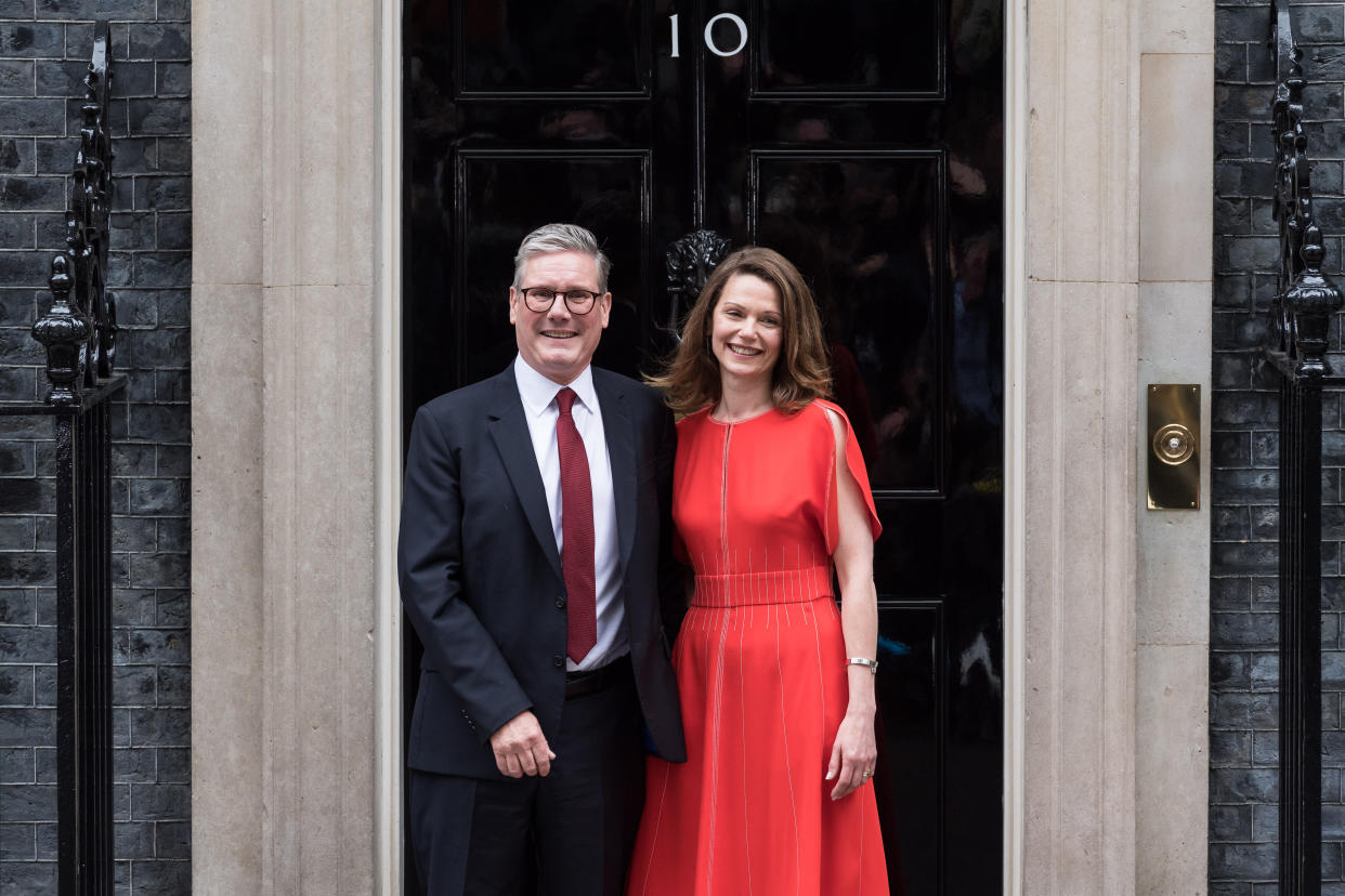 LONDON, UNITED KINGDOM - JULY 05: Leader of the Labour Party Sir Keir Starmer and his wife Victoria pose outside 10 Downing Street after being appointed Britain's 58th prime minister following a landslide general election victory in London, United Kingdom on July 05, 2024. (Photo by Wiktor Szymanowicz/Anadolu via Getty Images)