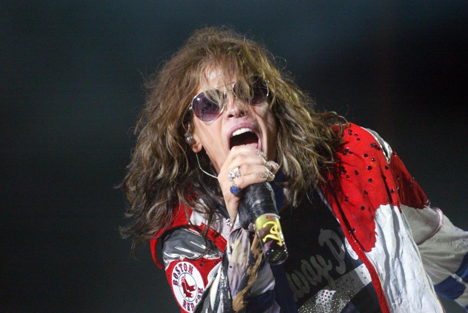 BOSTON - AUGUST 14:  Steven Tyler of Aerosmith performs at Fenway Park on August 14, 2010 in Boston, Massachusetts.  (Photo by John W. Ferguson/Getty Images)