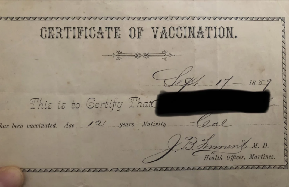 A vintage vaccination certificate dated Sept 17, 1887, certifies a 121-year-old named Cal has been vaccinated. Signed by J.B. Emmet, M.D., Health Officer, Martinez