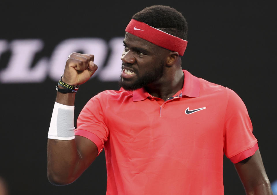 Frances Tiafoe of the U.S. reacts during his first round singles match against Russia's Daniil Medvedev at the Australian Open tennis championship in Melbourne, Australia, Tuesday, Jan. 21, 2020. (AP Photo/Lee Jin-man)