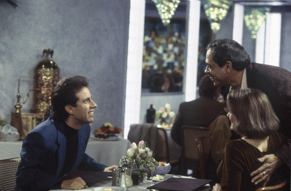 Reni Santoni, right, as Poppie, with Jerry Seinfeld and Suzanne Snyder on "Seinfeld." (Photo: NBC via Getty Images)