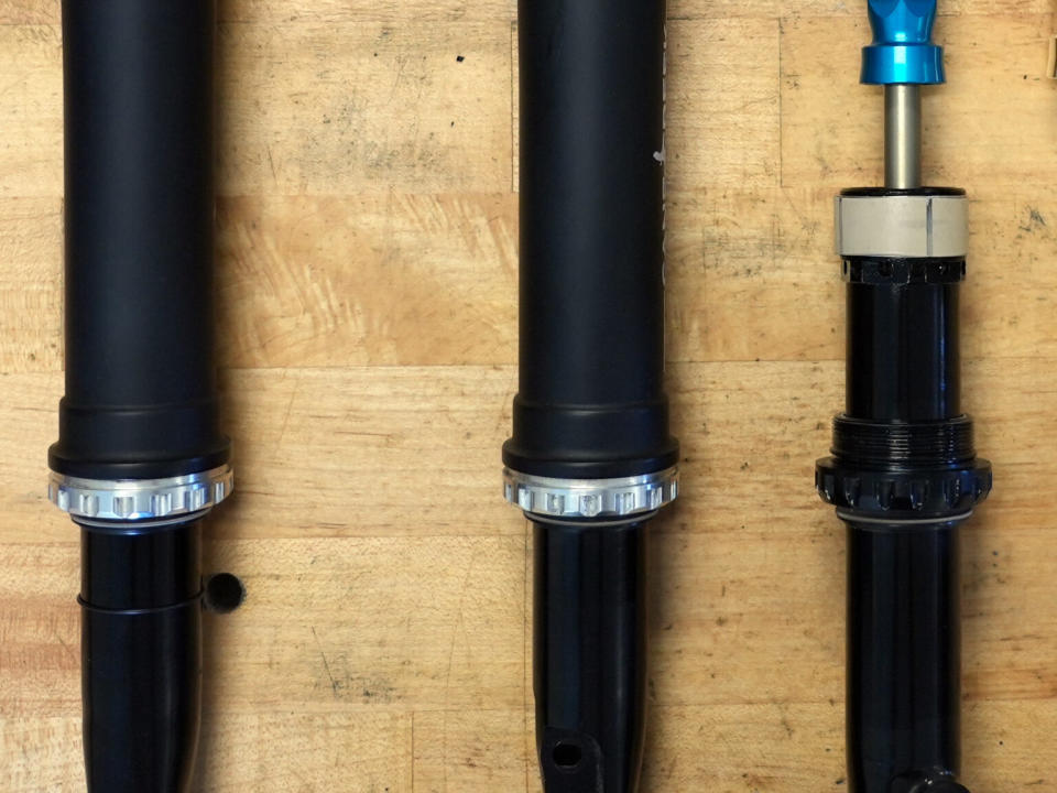 internal parts of cane creek invert fork shown disassembled