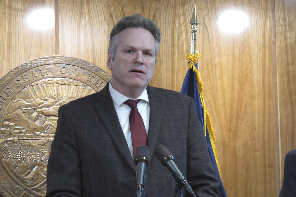 Alaska Gov. Mike Dunleavy addresses reporters during a news conference in support of a state fiscal plan on April 27, 2023, in Juneau, Alaska. Dunleavy is expected to sign legislation on Tuesday, May 23, 2023, that would allow the state to set up a carbon offset program. (AP Photo/Becky Bohrer)