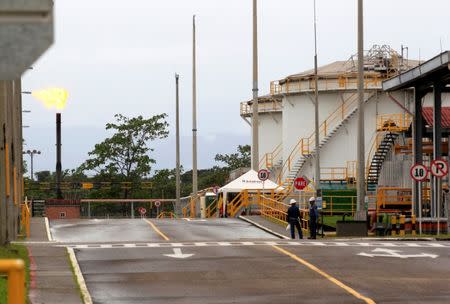 Workers are seen at Ecopetrol's Castilla oil rig platform, in Castilla La Nueva, Colombia June 26, 2018. Picture taken June 26, 2018. REUTERS/Luisa Gonzalez