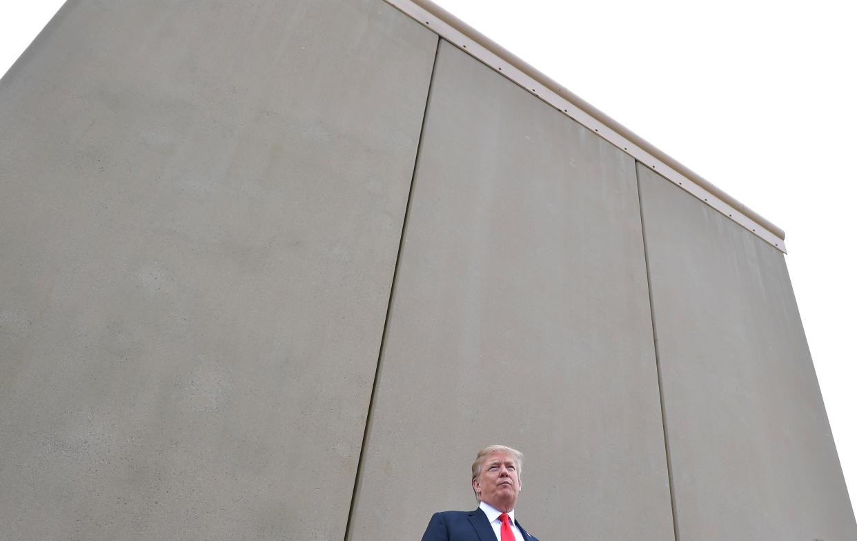 US President Donald Trump speaks during an inspection of border wall prototypes in San Diego, California on March 13, 2018. (Photo credit: MANDEL NGAN/AFP/Getty Images)