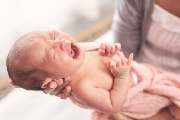 The postpartum period is draining, but it is possible to take care of your baby and yourself. (Photo: Rachaphak via Getty Images)