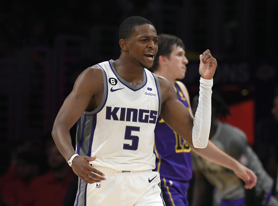 LOS ANGELES, CA - NOVEMBER 11: De'Aaron Fox #1  5 of the Sacramento Kings celebrates after scoring a late game three-point field goal against the Los Angeles Lakers at Crypto.com Arena on November 11, 2022 in Los Angeles, California.  NOTE TO USER: You expressly acknowledge and agree that by downloading and/or using this photograph, you are agreeing to the terms and conditions of the Getty Images License Agreement.  (Photo by Kevork Djansezian/Getty Images)