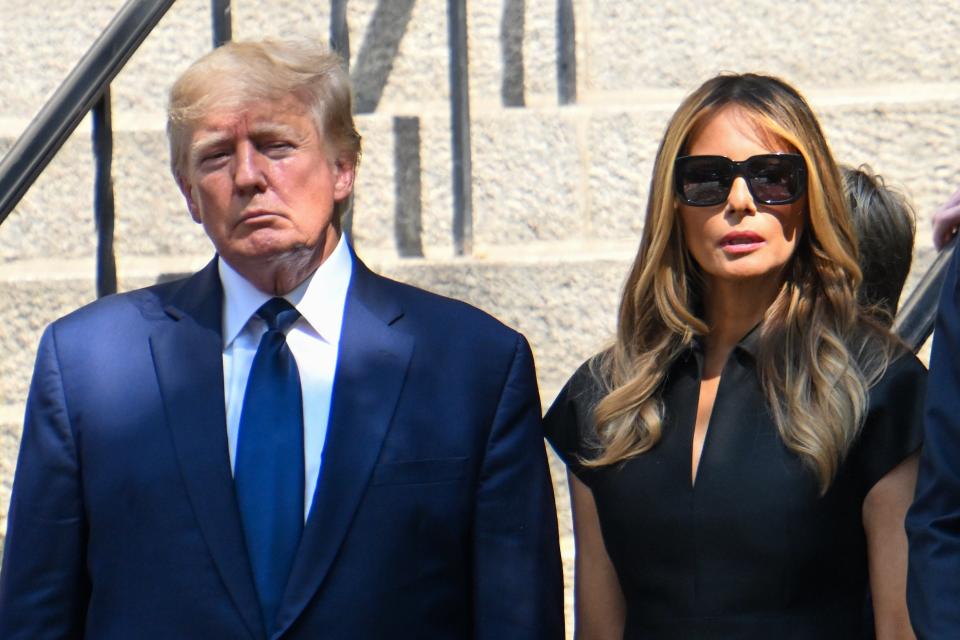 Former president Donald Trump and Melania Trump exit the funeral of Ivana Trump at St Vincent Ferrer Roman Catholic Church in New York City (Getty Images)