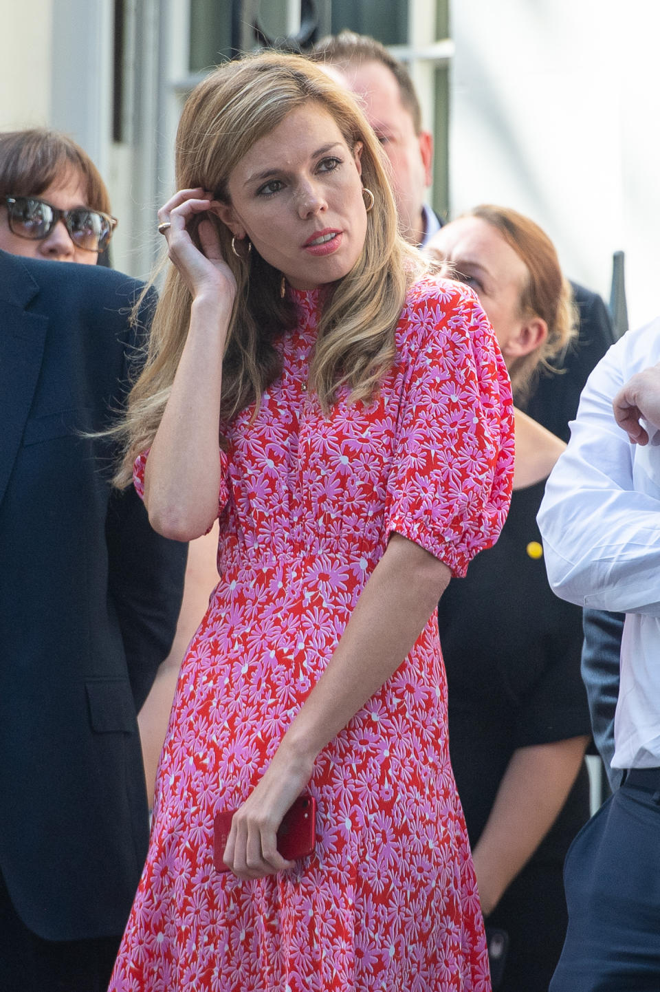 New Prime Minister Boris Johnson's partner Carrie Symonds waits for him to make a speech outside 10 Downing Street, London, after meeting Queen Elizabeth II and accepting her invitation to become Prime Minister and form a new government.